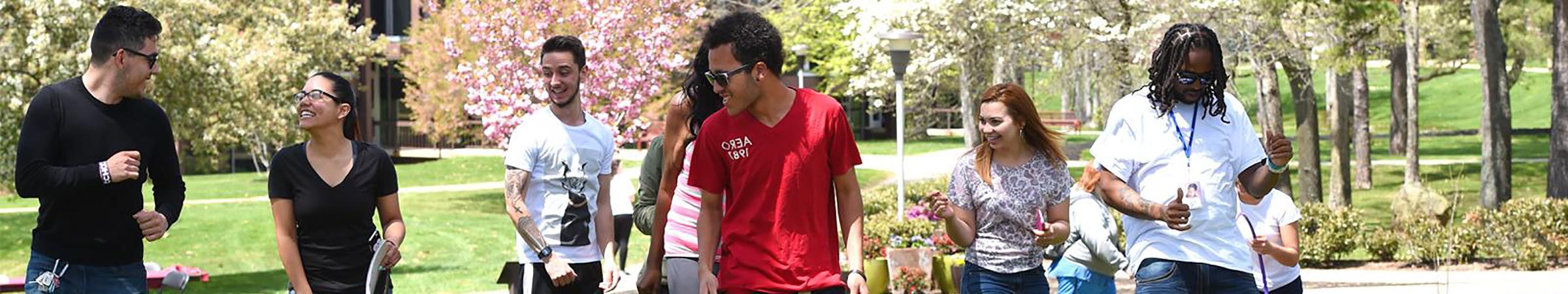 STEM Students in classroom and in front of MEC Building